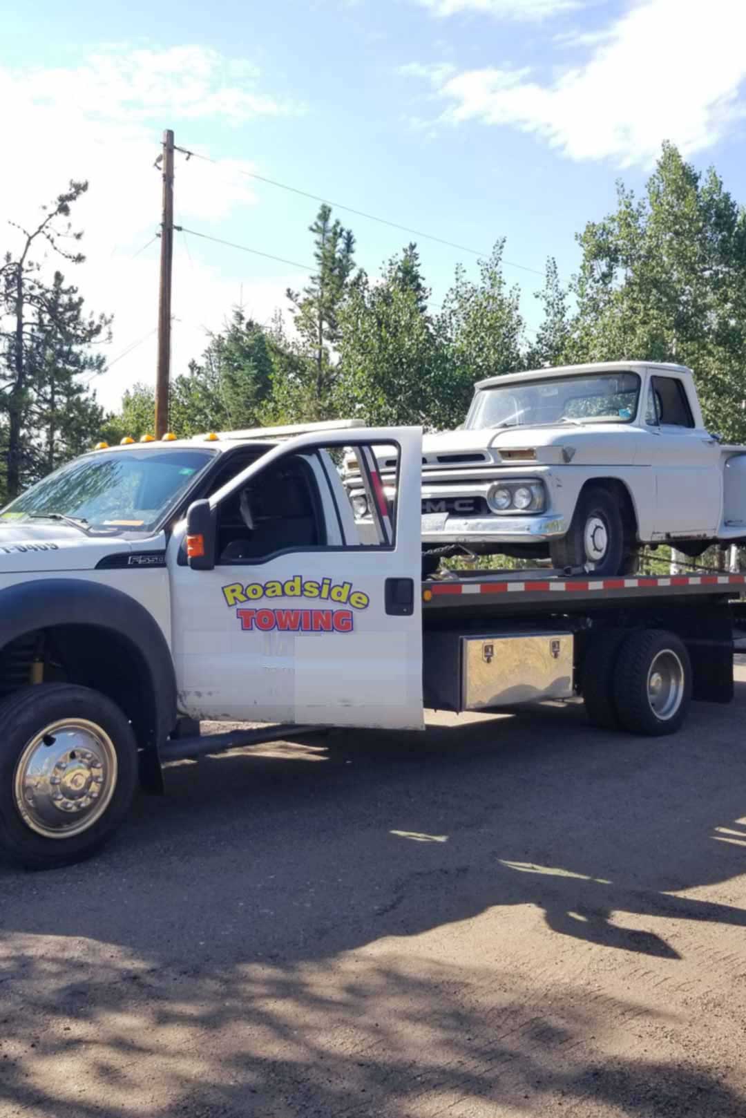 Tow truck providing accident recovery services